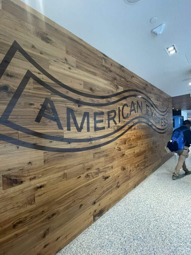 American Express sign at Centurion lounge, a key feature of Centurion lounge LAX and Centurion lounge Miami