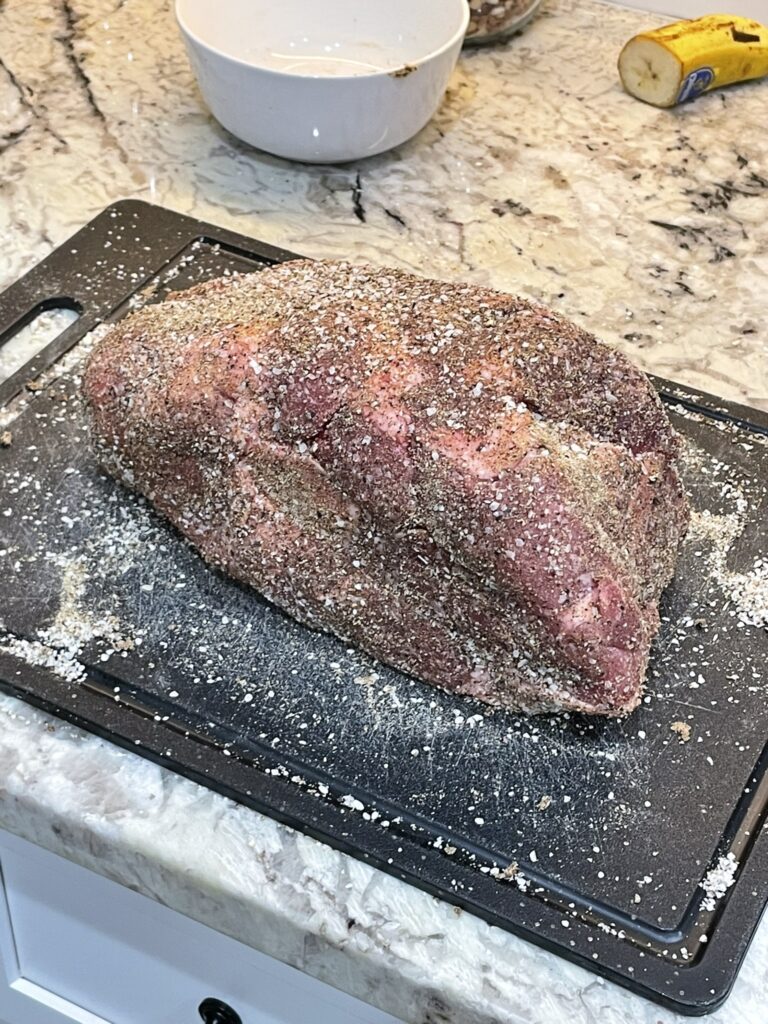 Pork rubbed with the Traeger-specific blend of seasonings for the smoked pulled pork.