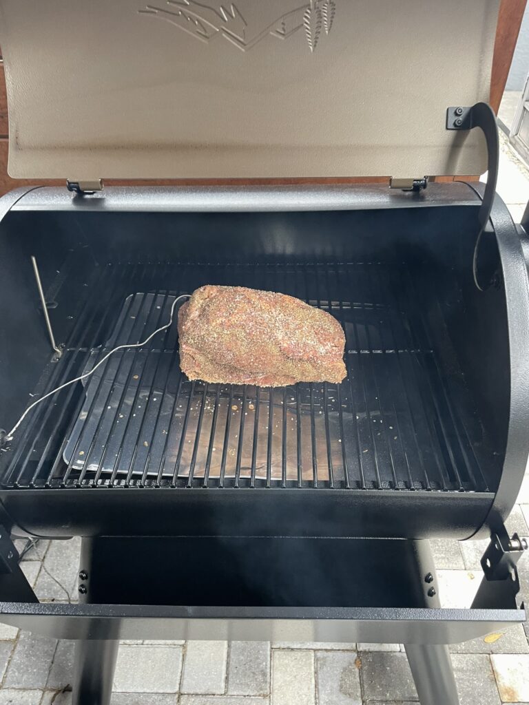 Pork just put on a Traeger Grill for smoking.