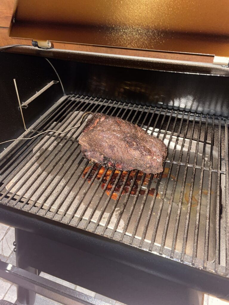 Pulled pork on Traeger grill after a slow and steady smoking process.