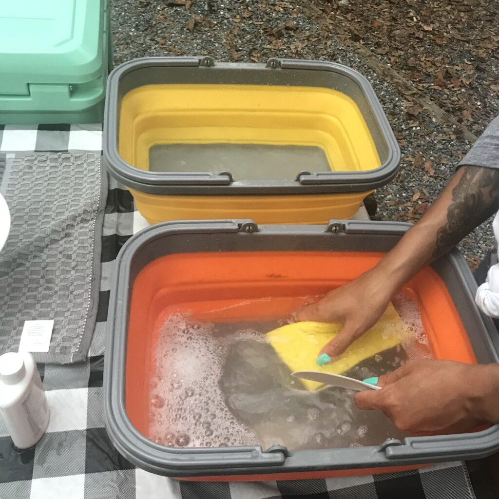 The Tiawudi 2 Pack Collapsible Sink with a capacity of 2.25 gallons. The sink is compact and portable, a must have when thinking about your camping kitchen set up ideas.