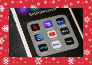 Various video streaming apps featuring the best Christmas movies to stream.