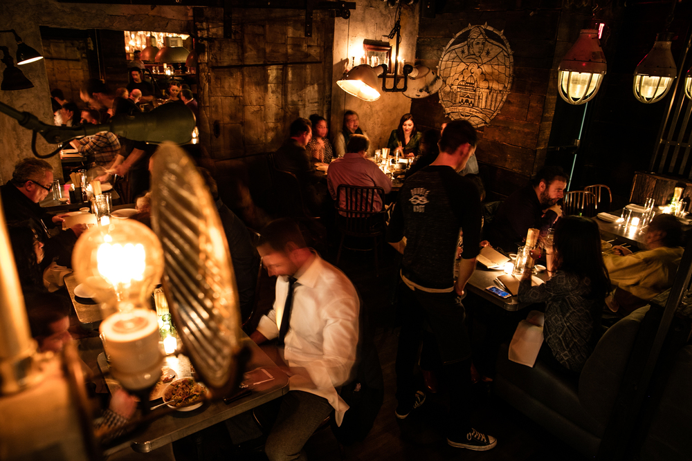 Interior view of Double Knot, considered the best Japanese restaurant near me, featuring stylish décor and comfortable seating.