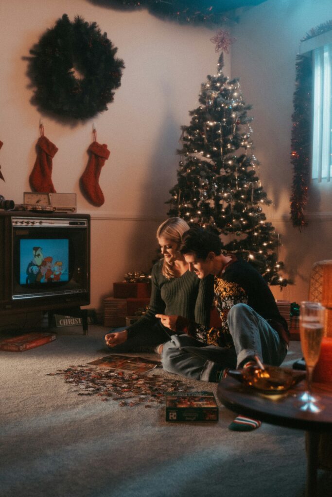 Christmas movie playing on a TV, showcasing how to enjoy Christmas movies on Hulu.