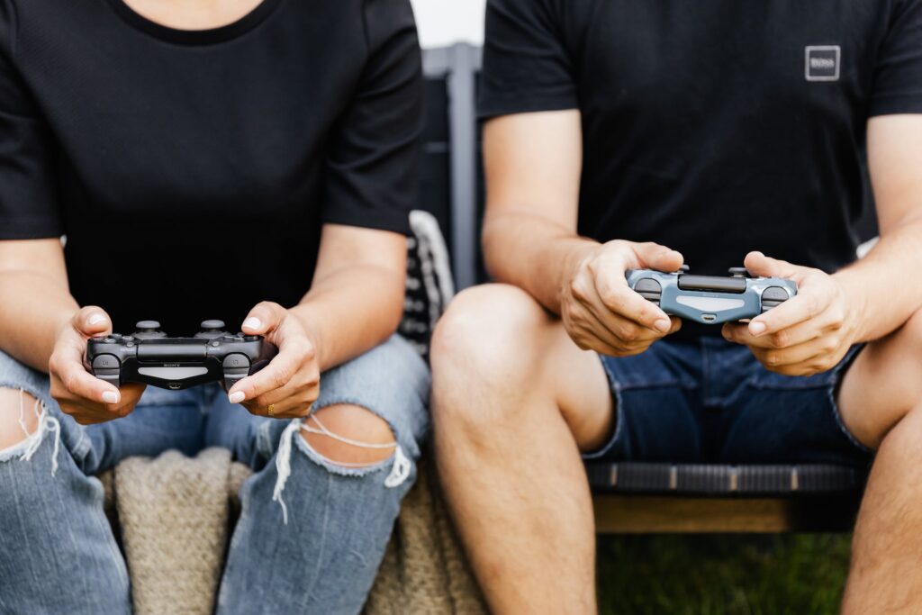 Group of gamers holding Scuf controllers during a competitive gaming session.