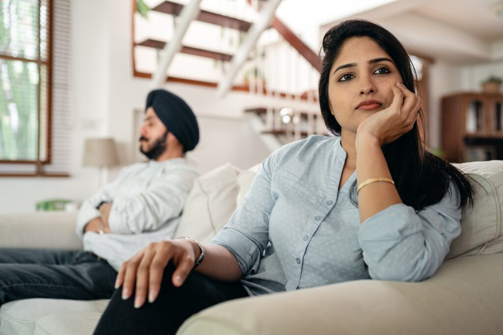 Married couple avoiding challenging communication in marriage