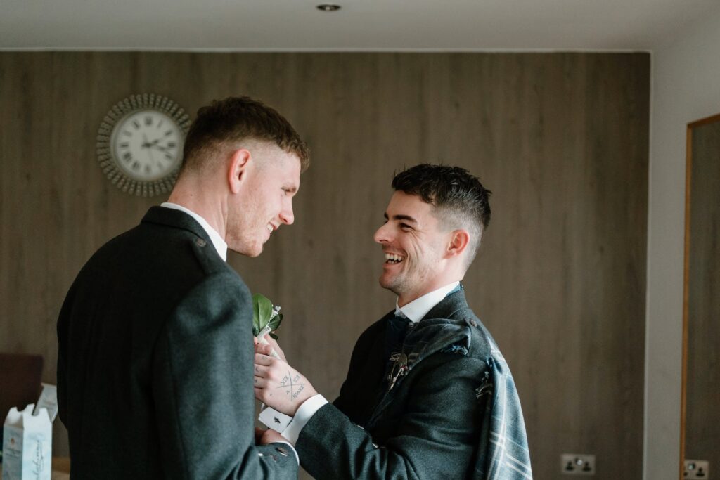 Best friend wedding speech moment captured between the best man and the groom.