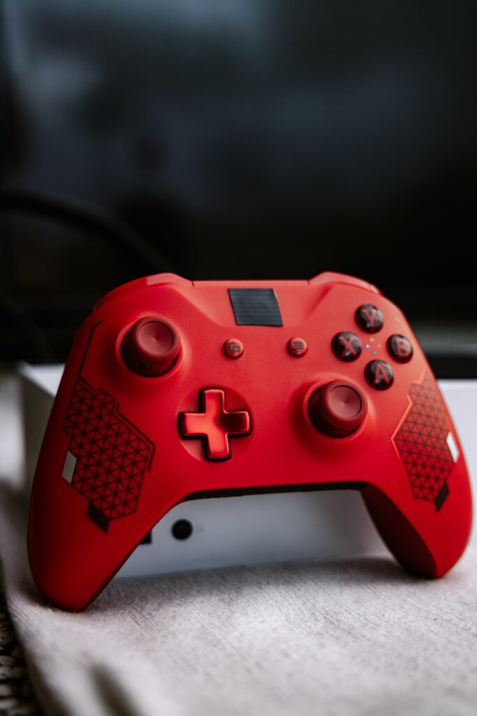 Striking red custom Xbox Scuf controller, designed for superior performance.