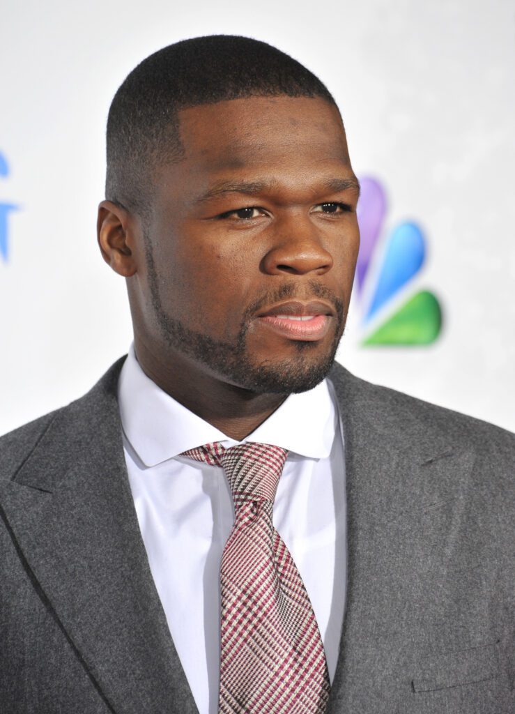 50 Cent showing off a short beard style, specifically the chin strap beard style.