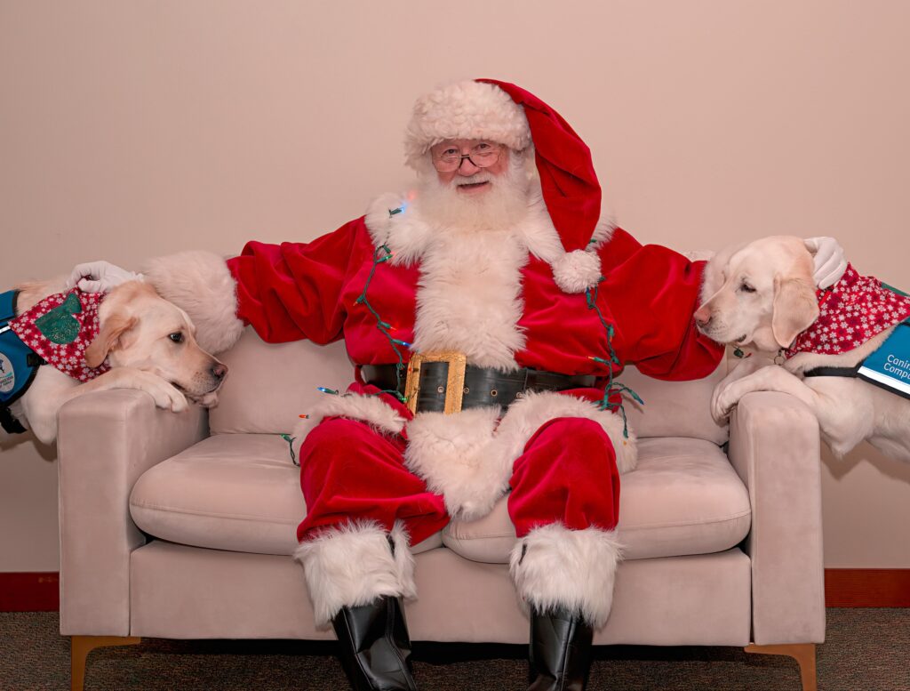 Image of Santa sitting on a couch, enjoying Christmas movies on Peacock.